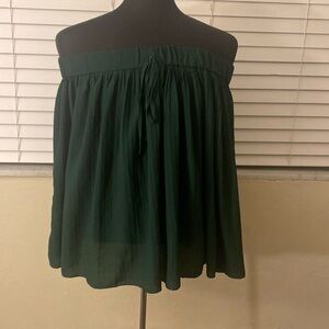 Green pleated mini skirt